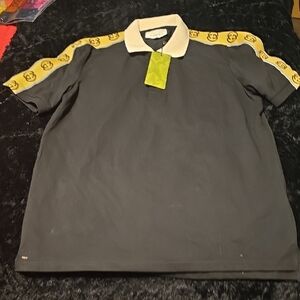 Gucci Polo Shirt in Black with Gold Logo Stripes